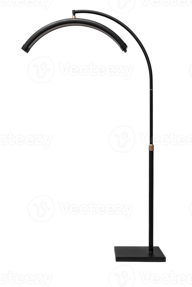 Modern LED floor lamp in the shape of a crescent. Lamp for minimalist interiors. Isolate on a white back photo