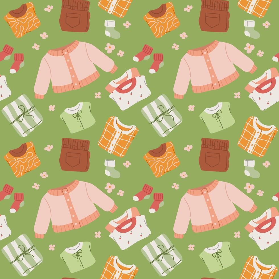 Seamless pattern featuring a variety of child clothing items. Collection of cute kids apparel on green background. Top view. Flat vector illustration.