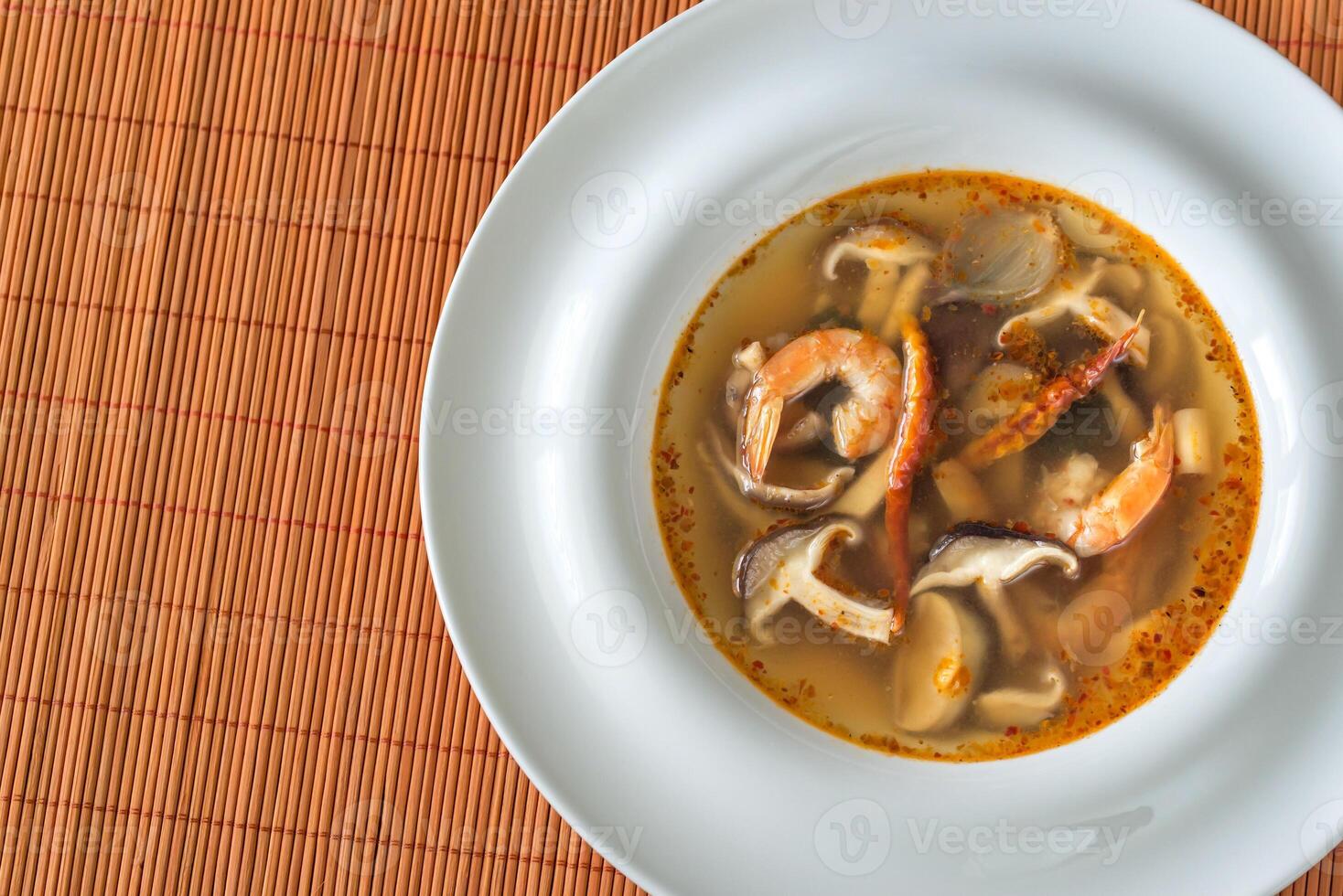 Portion of thai tom yum soup photo