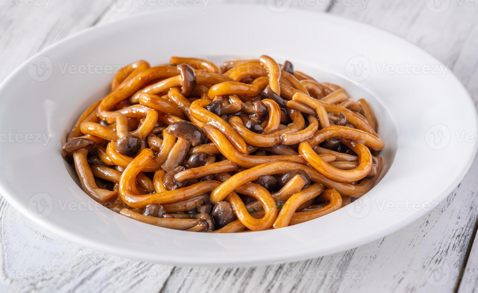 Udon noodles with mushrooms photo