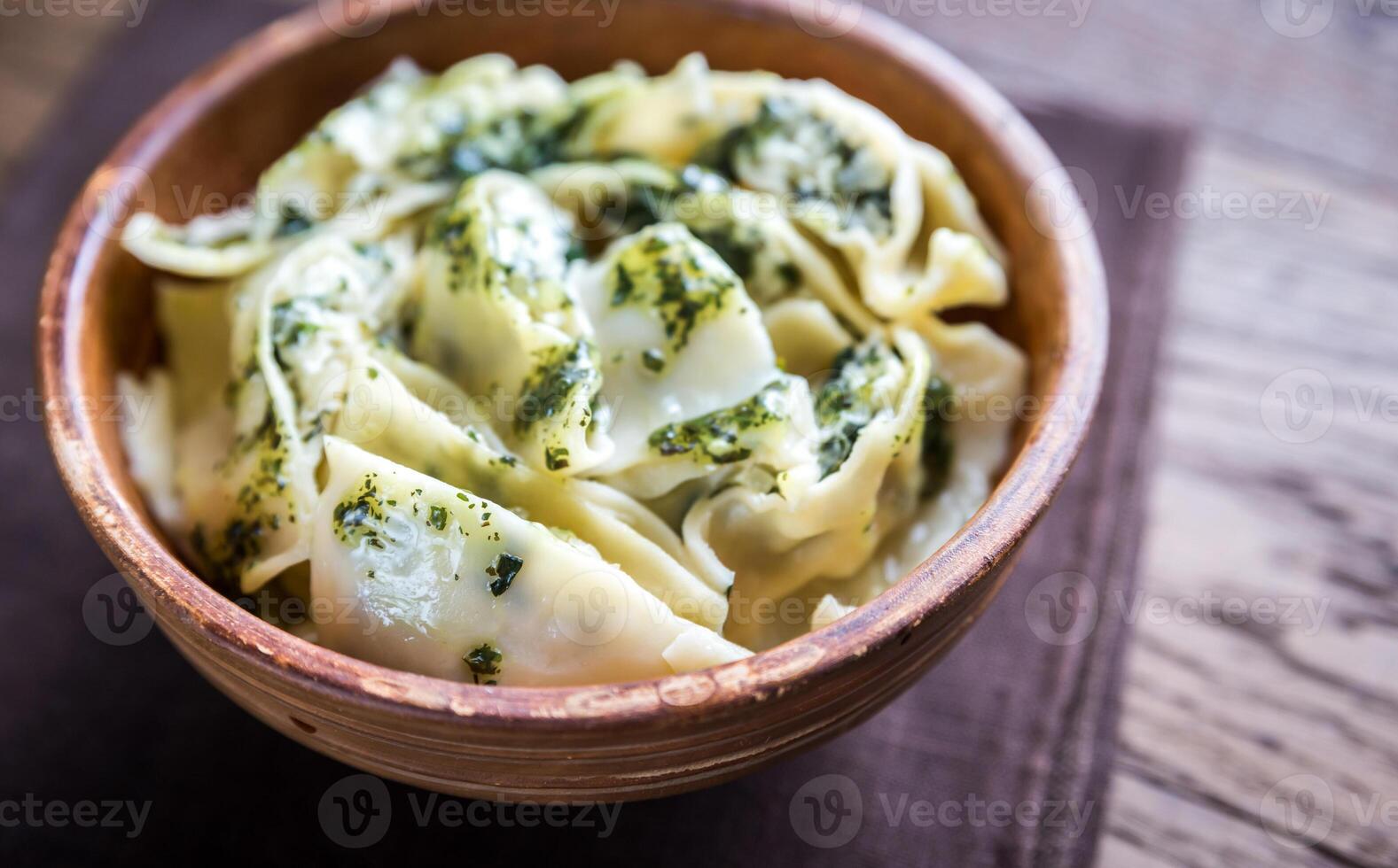 Tortellini with ricotta and spinach under mint sauce photo