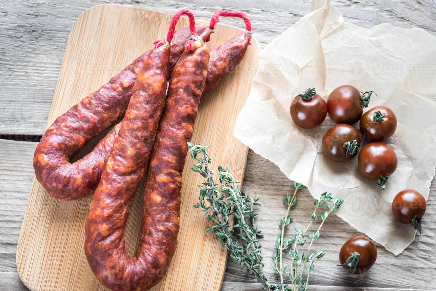 Chorizo with cherry tomatoes photo