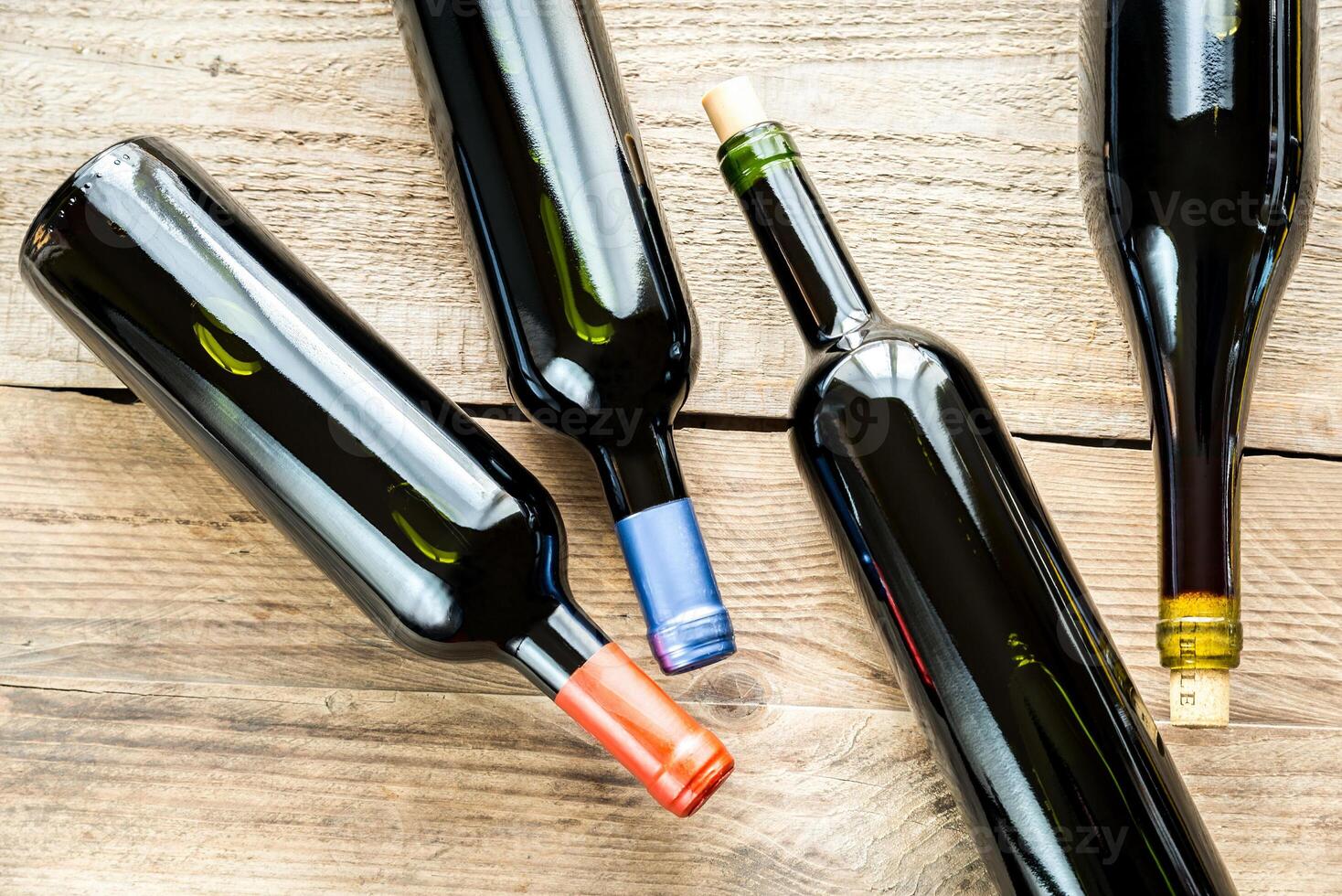 Bottles with red wine photo