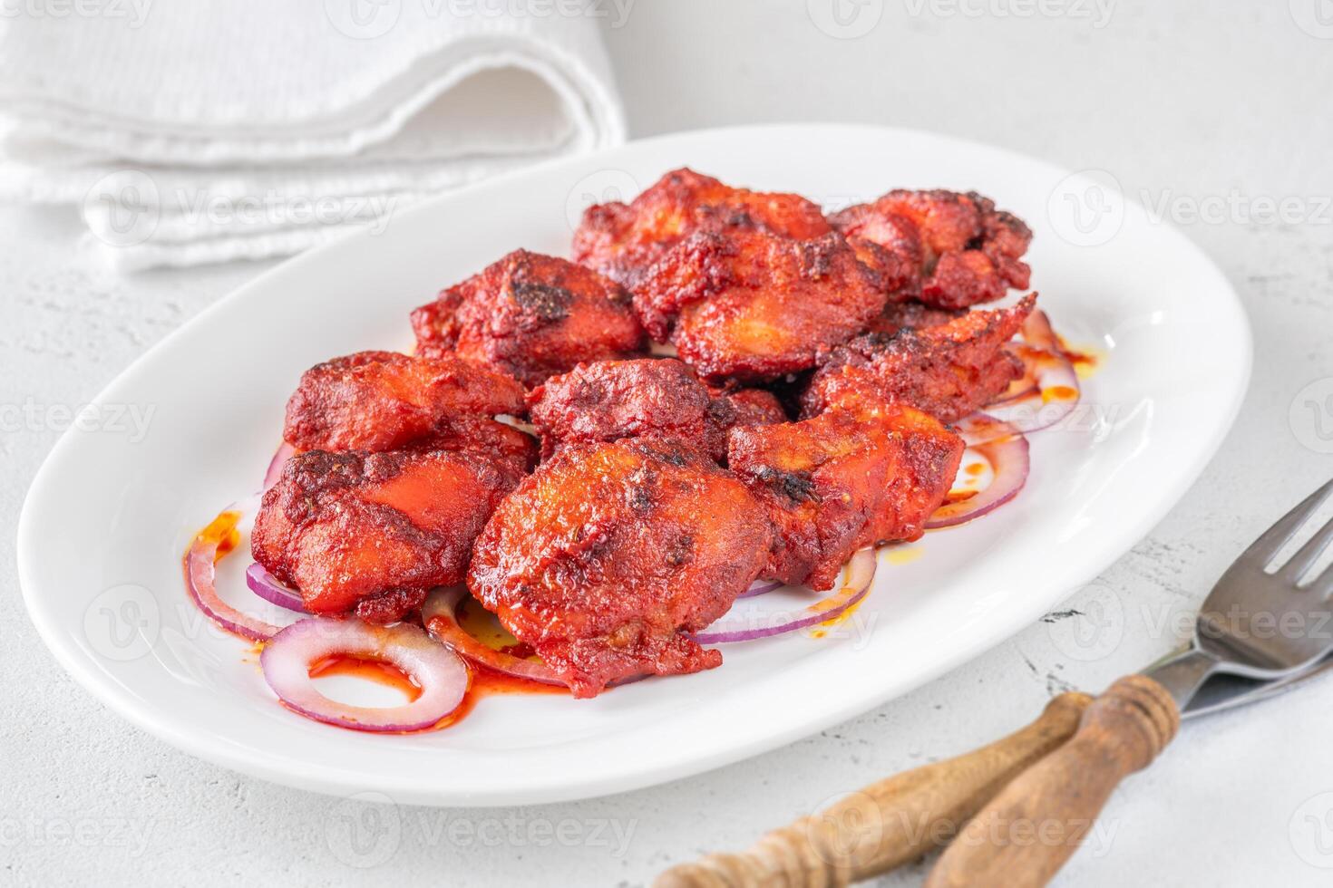 Portion of Chicken tikka photo