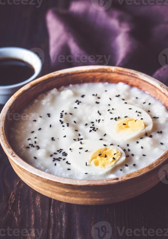 Bowl of congee - Asian rice porridge photo