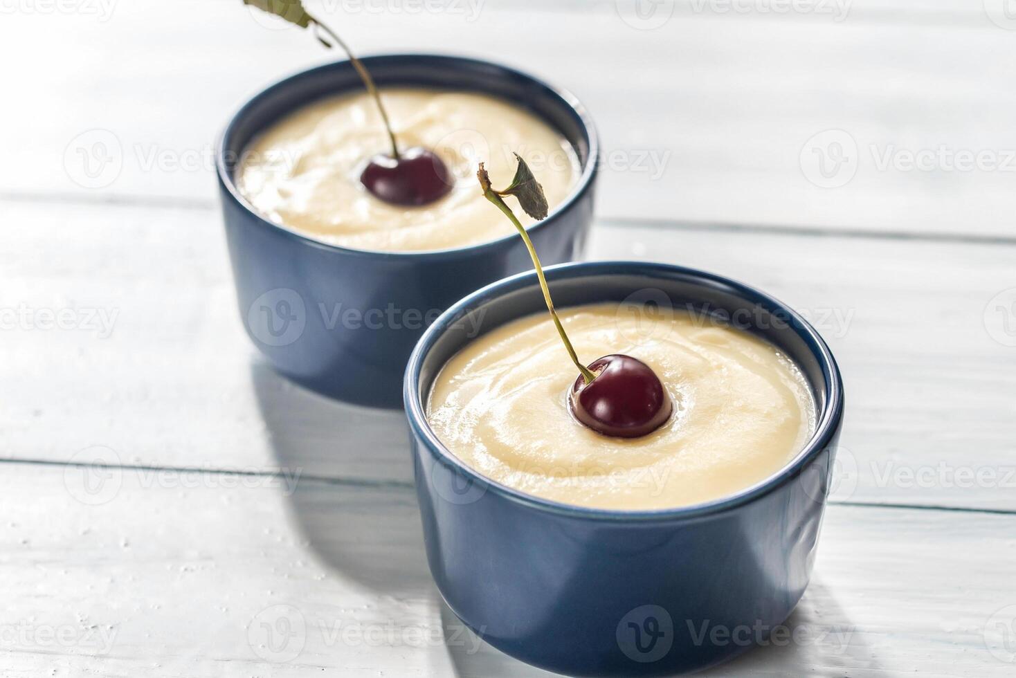 Custard with cherries photo