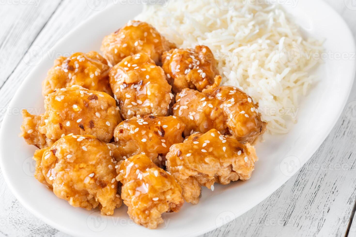 Portion of orange chicken photo