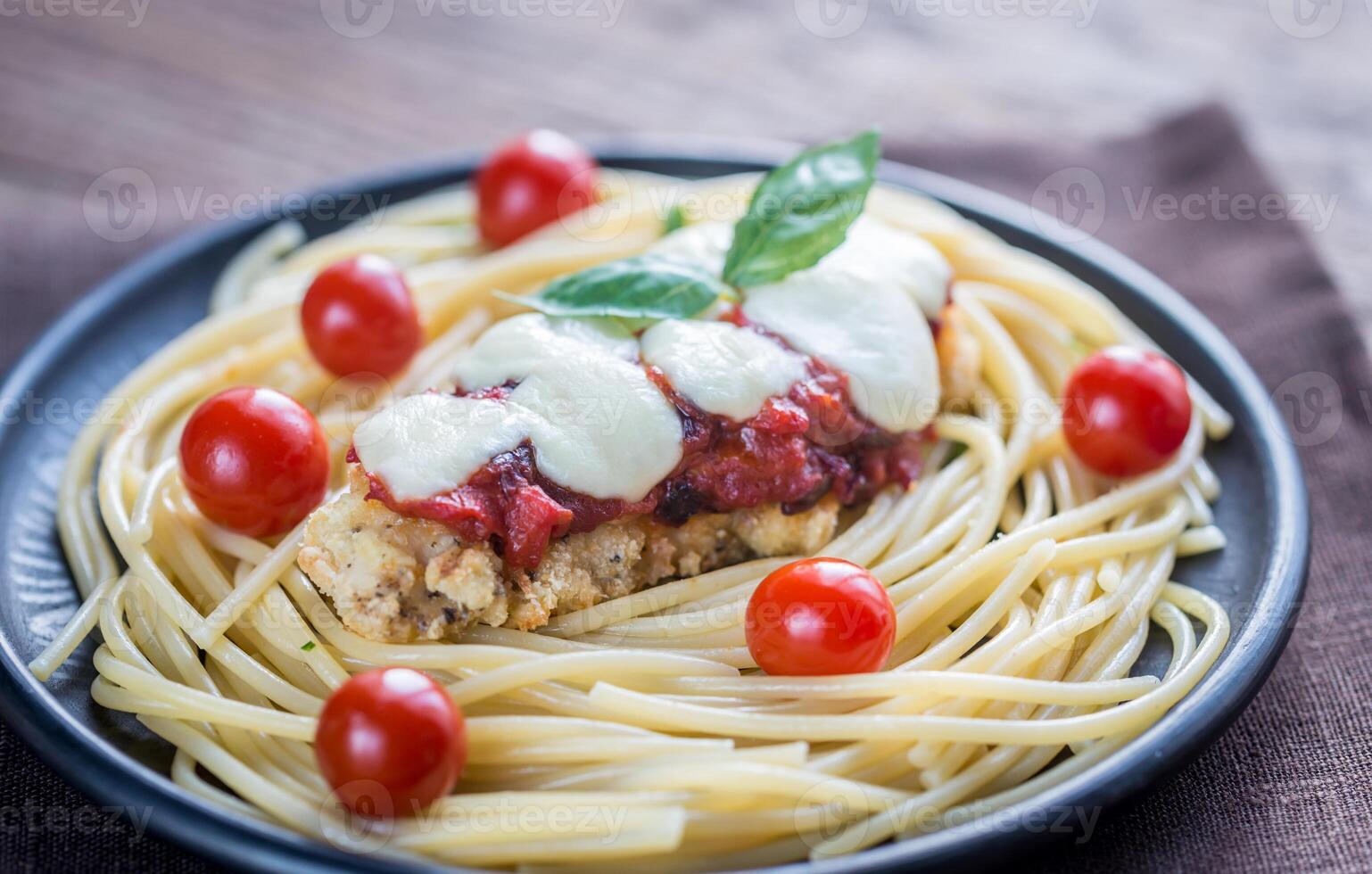 Baked chicken with parmesan and mozzarella photo