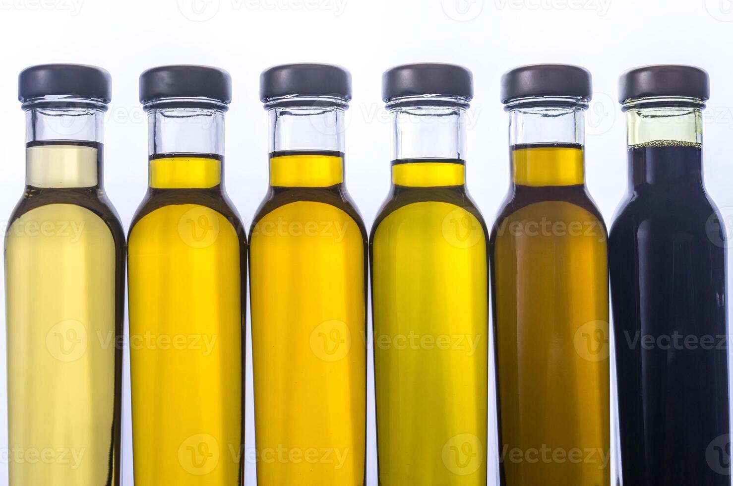 Bottles with different kinds of vegetable oil photo