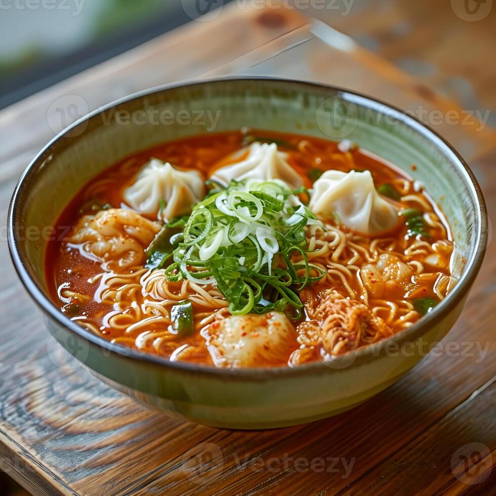 AI generated Kimchi noodle soup with dumplings in a light green bowl on a wooden table photo