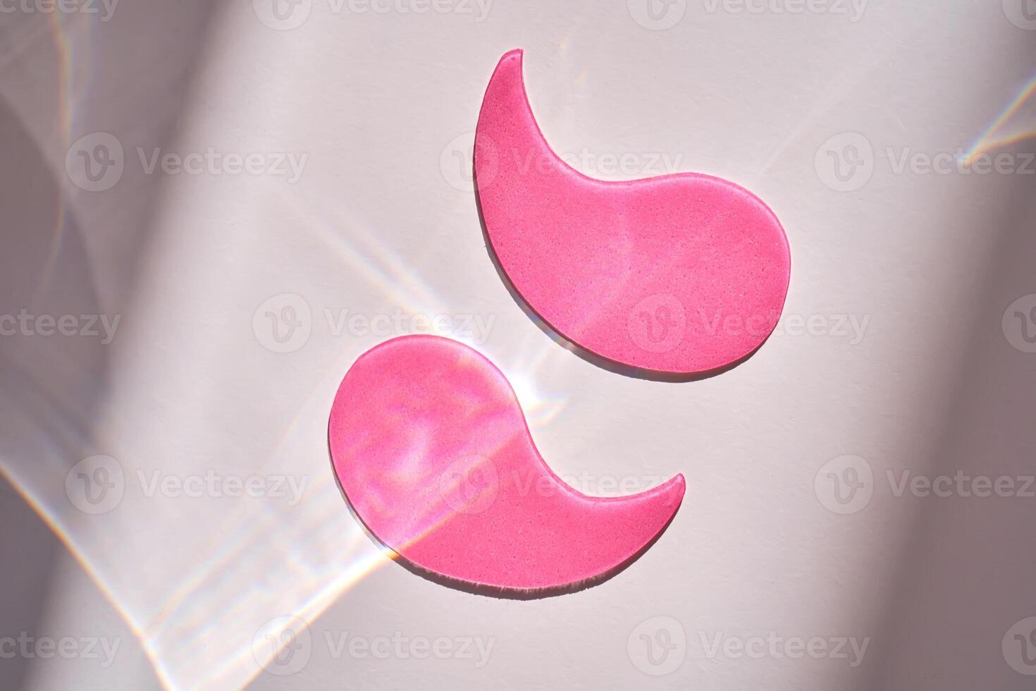 Pink moisturizing hyaluronic eye patches. photo