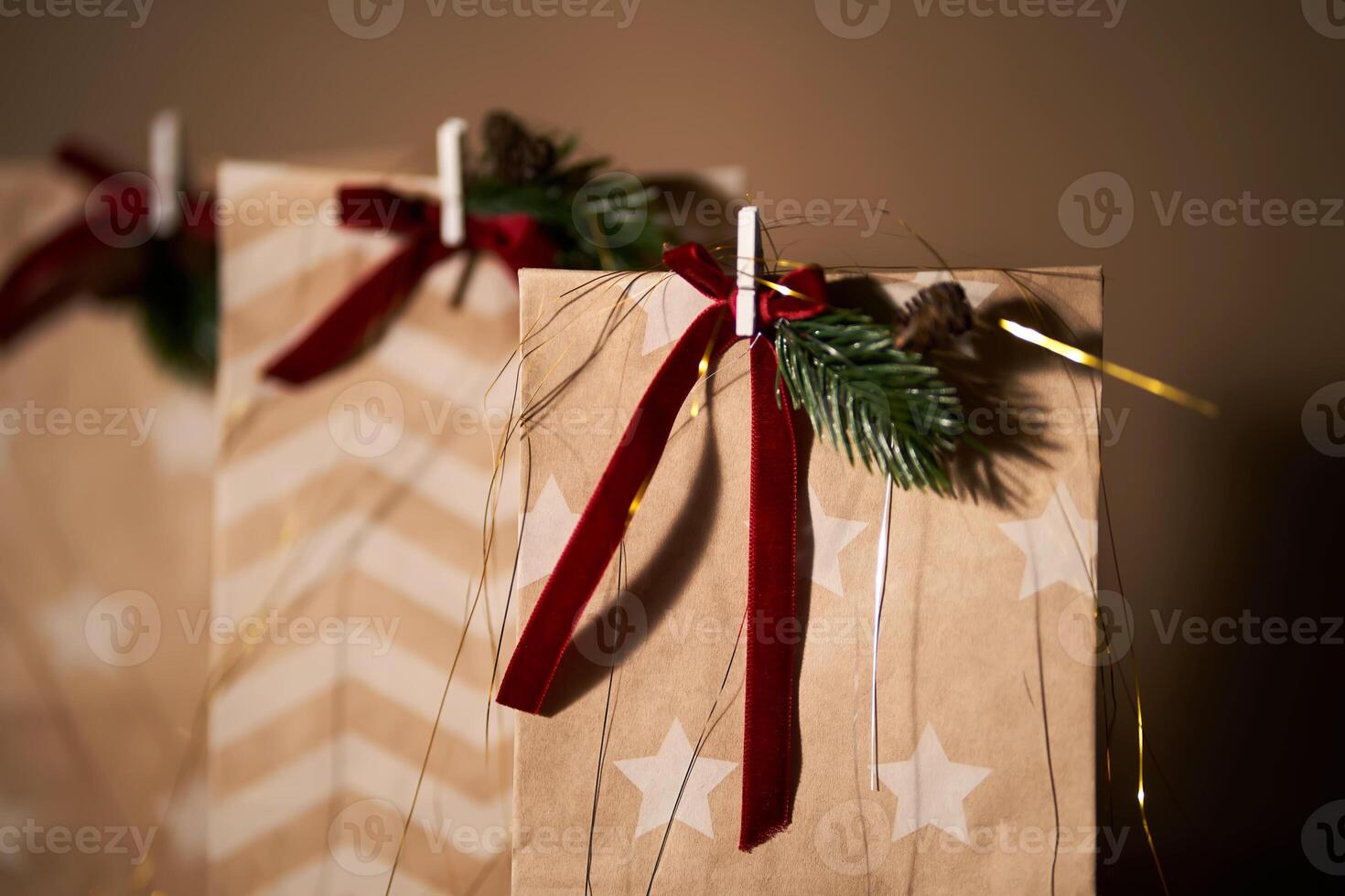 Christmas gift bags with decor and Christmas ornament. photo