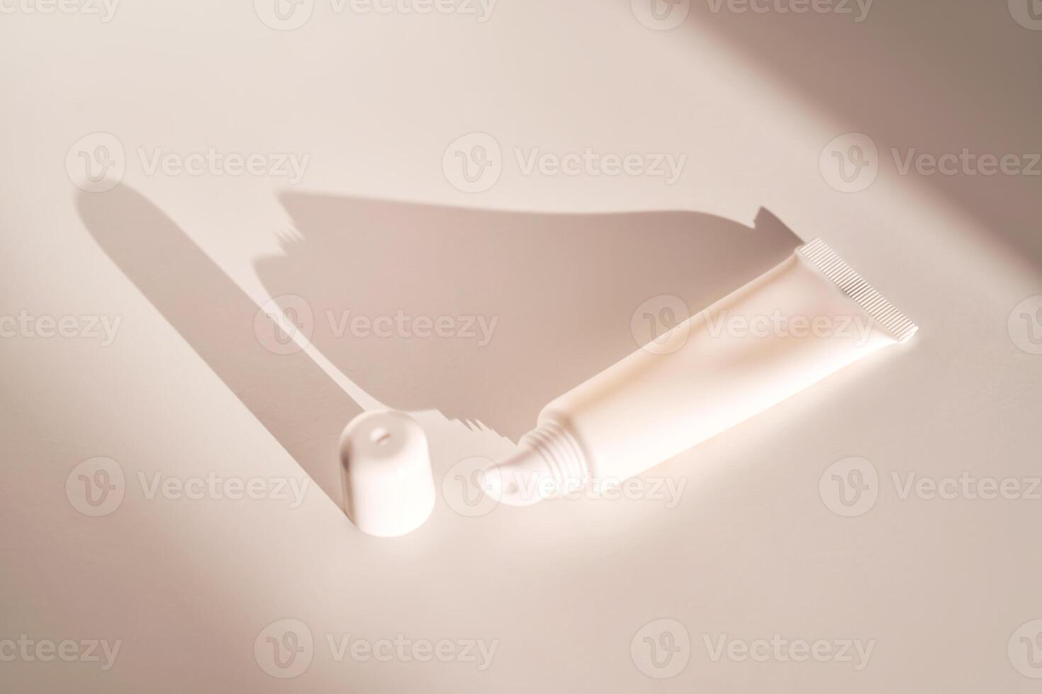 Hygienic moisturizing lip balm in a tube on a white background. photo