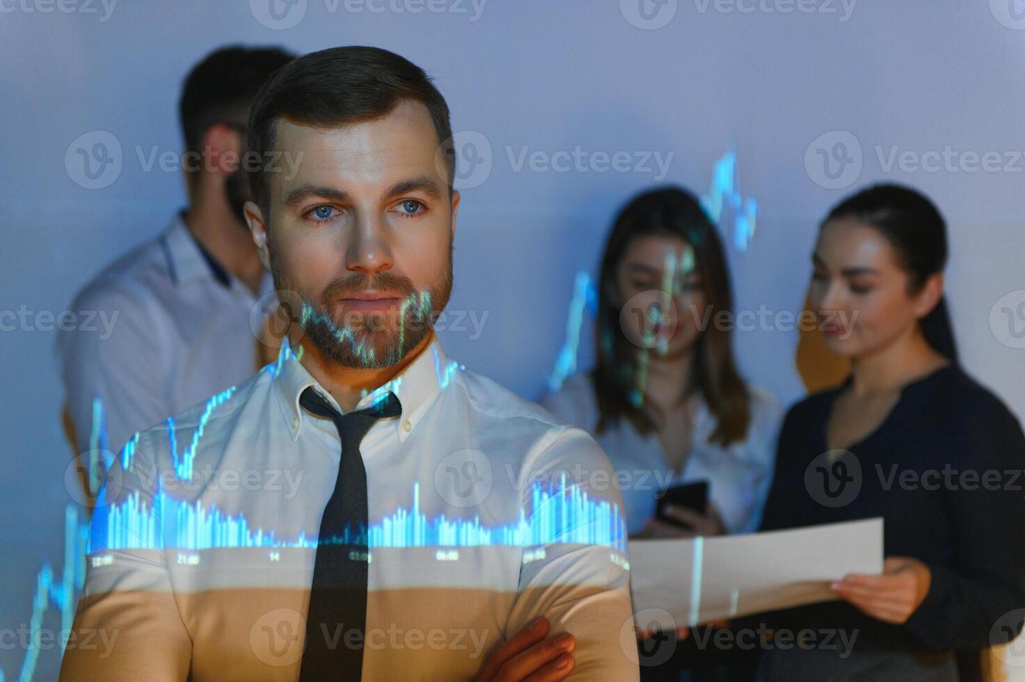 Group of business people working at modern office.Technical price graph, red and blue candlestick chart and stock trading computer screen background. Double exposure. Traders analyzing data photo