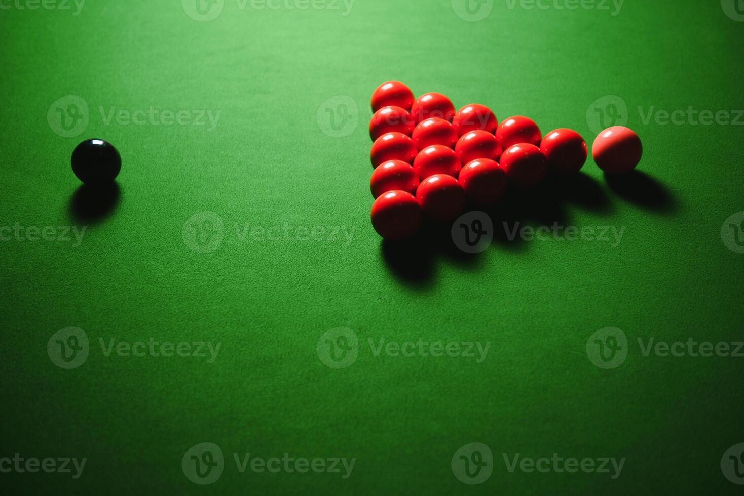 Snooker balls on the table in the pub at night. photo