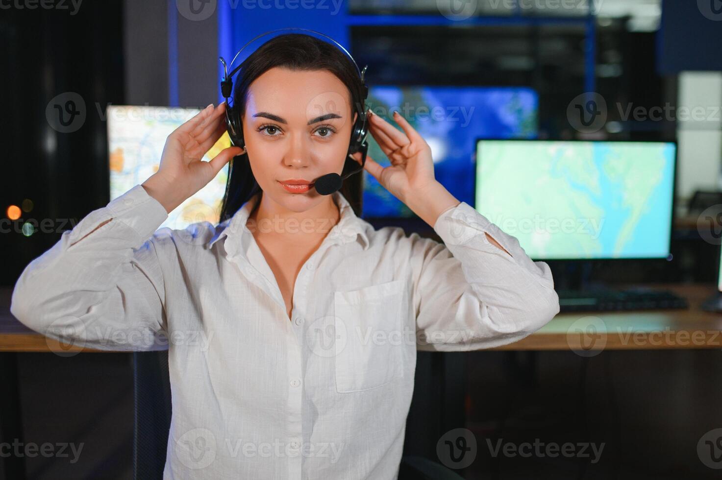 Photo of a successful dispatcher working on a computer in the office