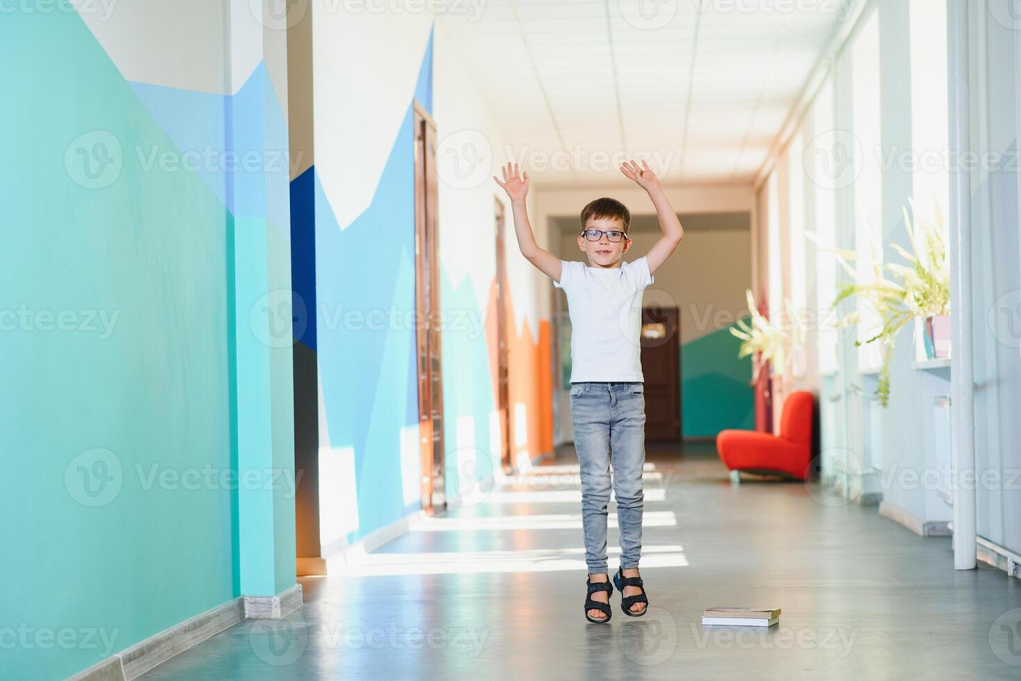 Back to school concept. School child in class. Happy kid against green blackboard. Smart child in classroom. Idea and education concept photo