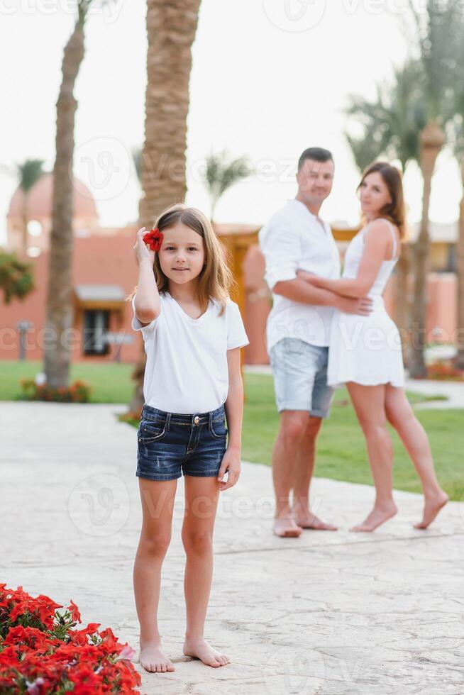 Family on vacation in a luxury hotel. Holidays at sea. photo