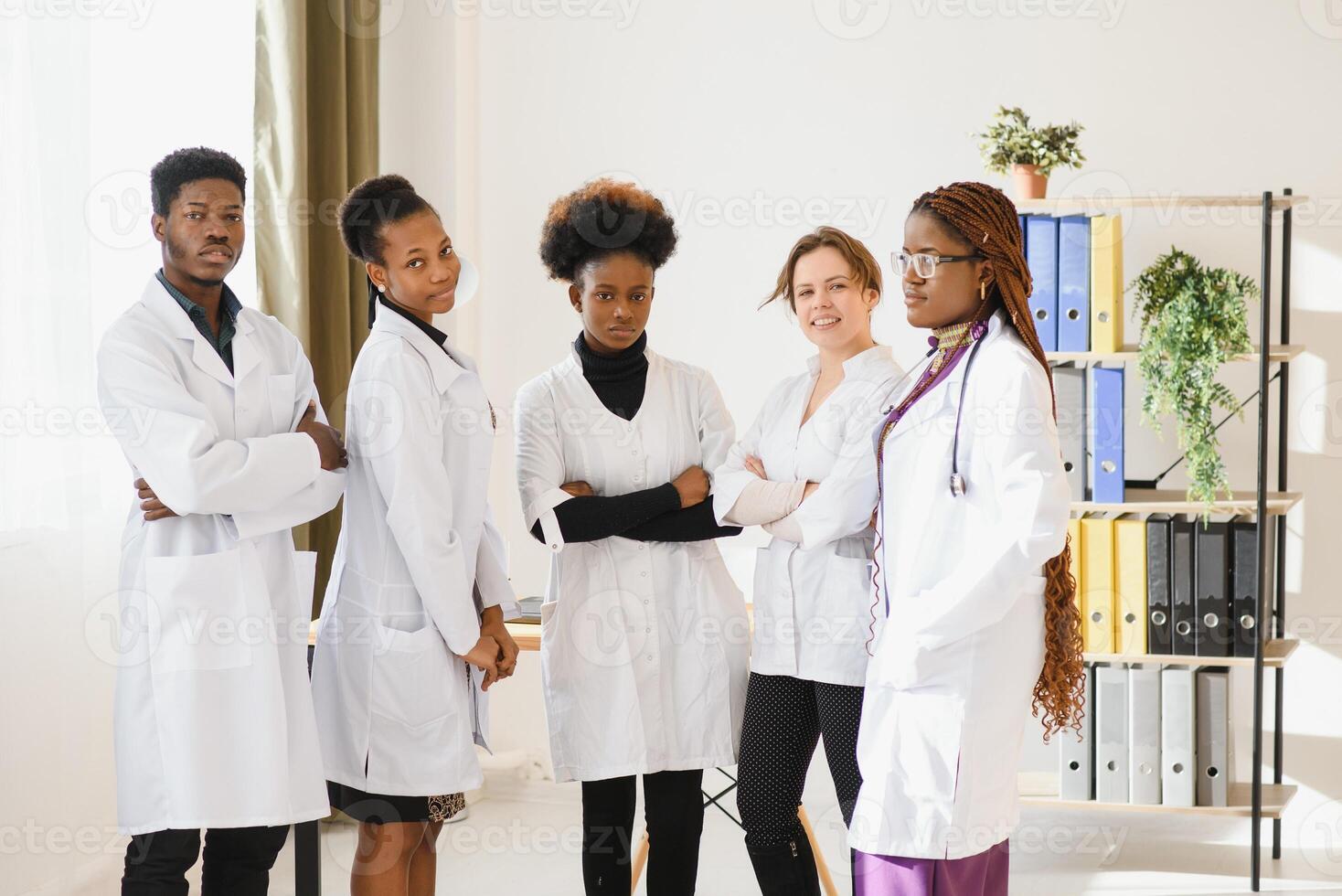 Group of doctors and nurses set in a hospital photo