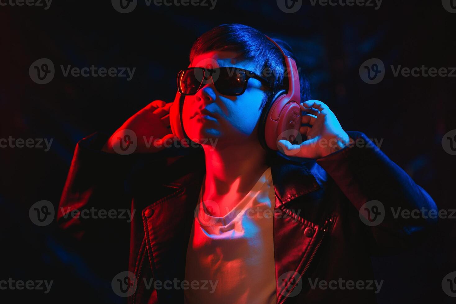 portrait of a man in neon light, soft light photo