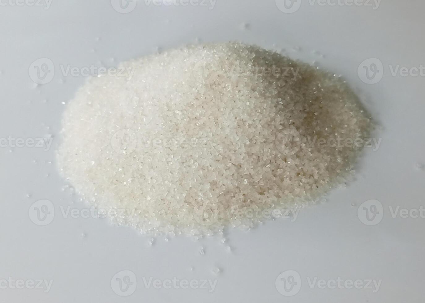 Sugar pile isolated on white background photo