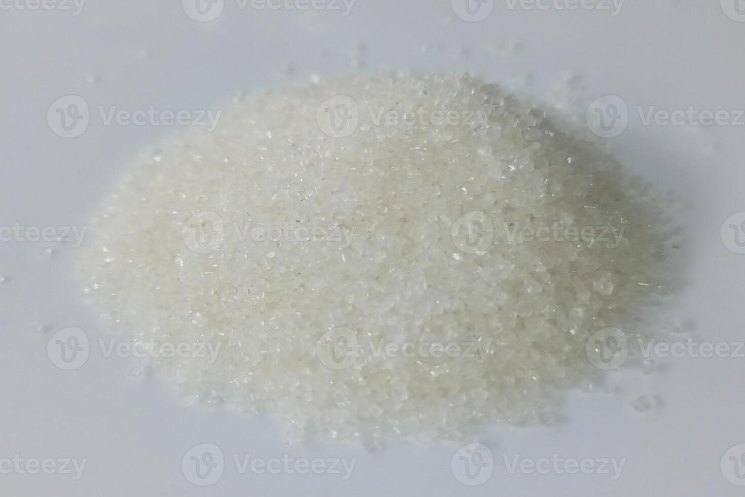 Sugar pile isolated on white background photo