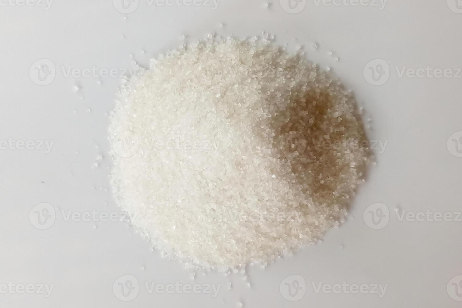 Sugar pile isolated on white background photo