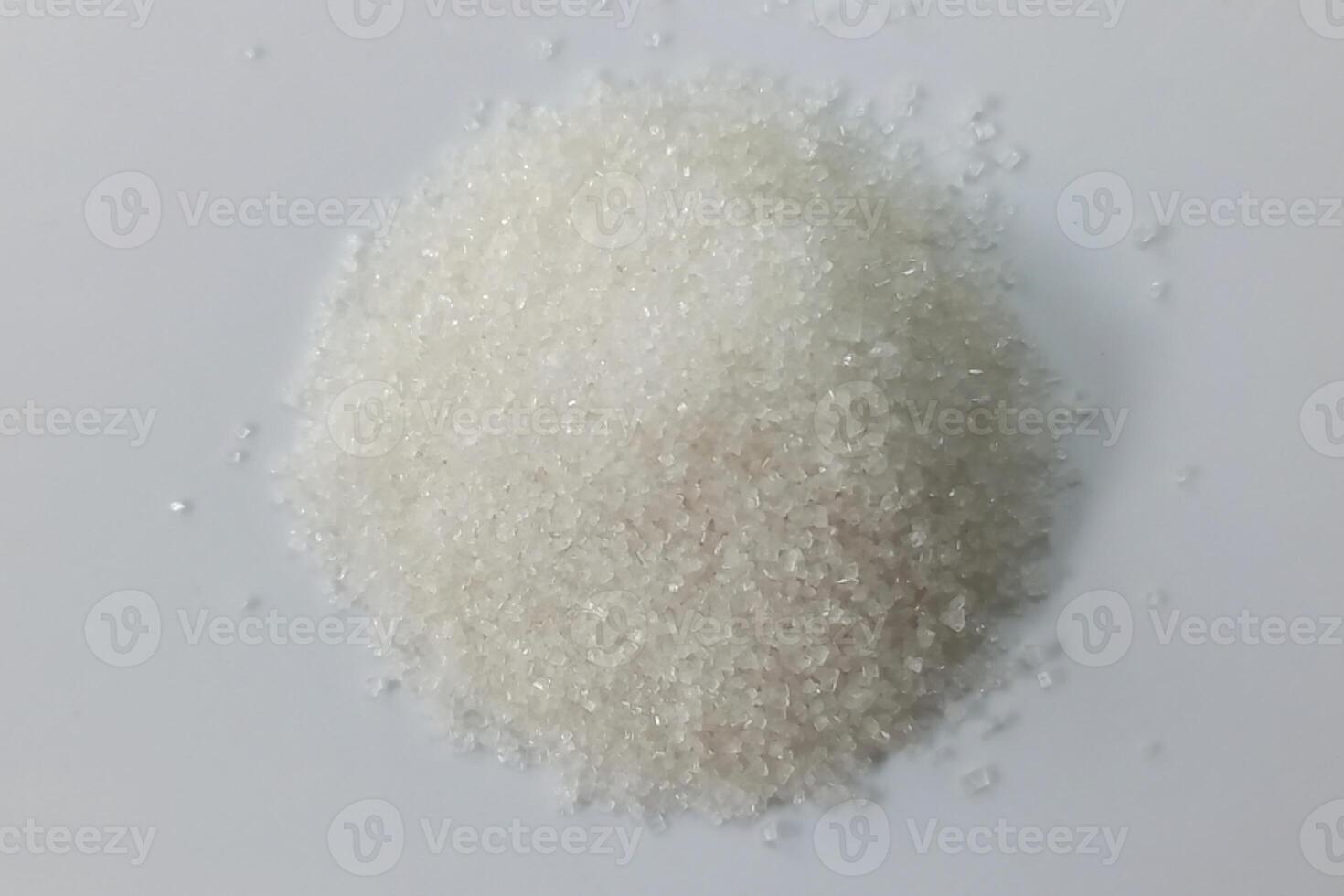 Sugar pile isolated on white background photo