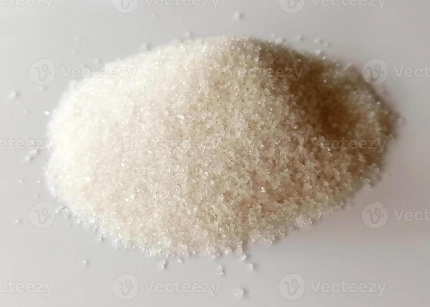 Sugar pile isolated on white background photo