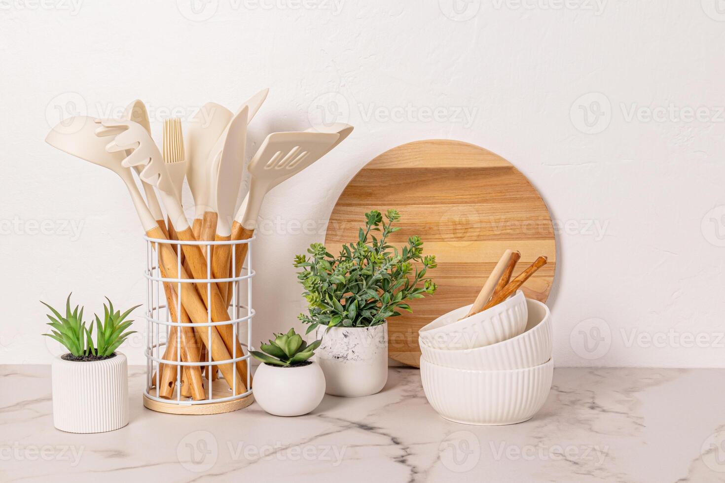 Stylish kitchen background with kitchen utensils on marble white countertop. Front view. minimalism. photo
