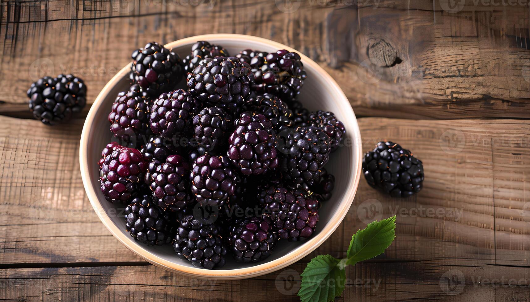AI generated Blackberries in a bowl on a wooden table top view. Blackberry harvest. Fresh and ripe blackberries freshly picked photo