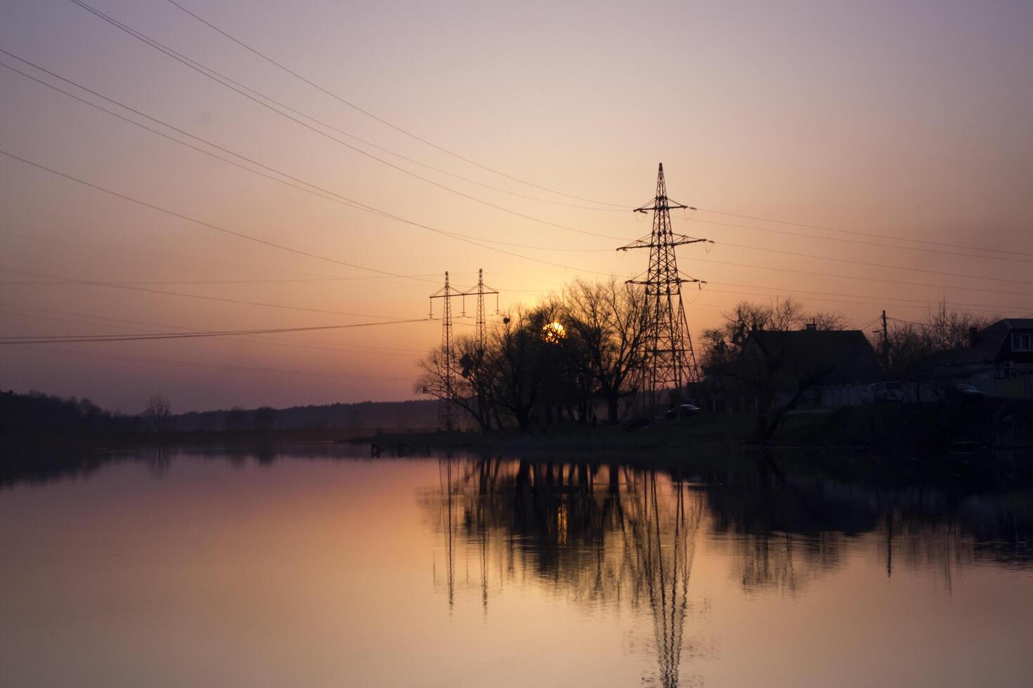 Sunset landscape. Pond at sunset time. Evening color of sky. photo