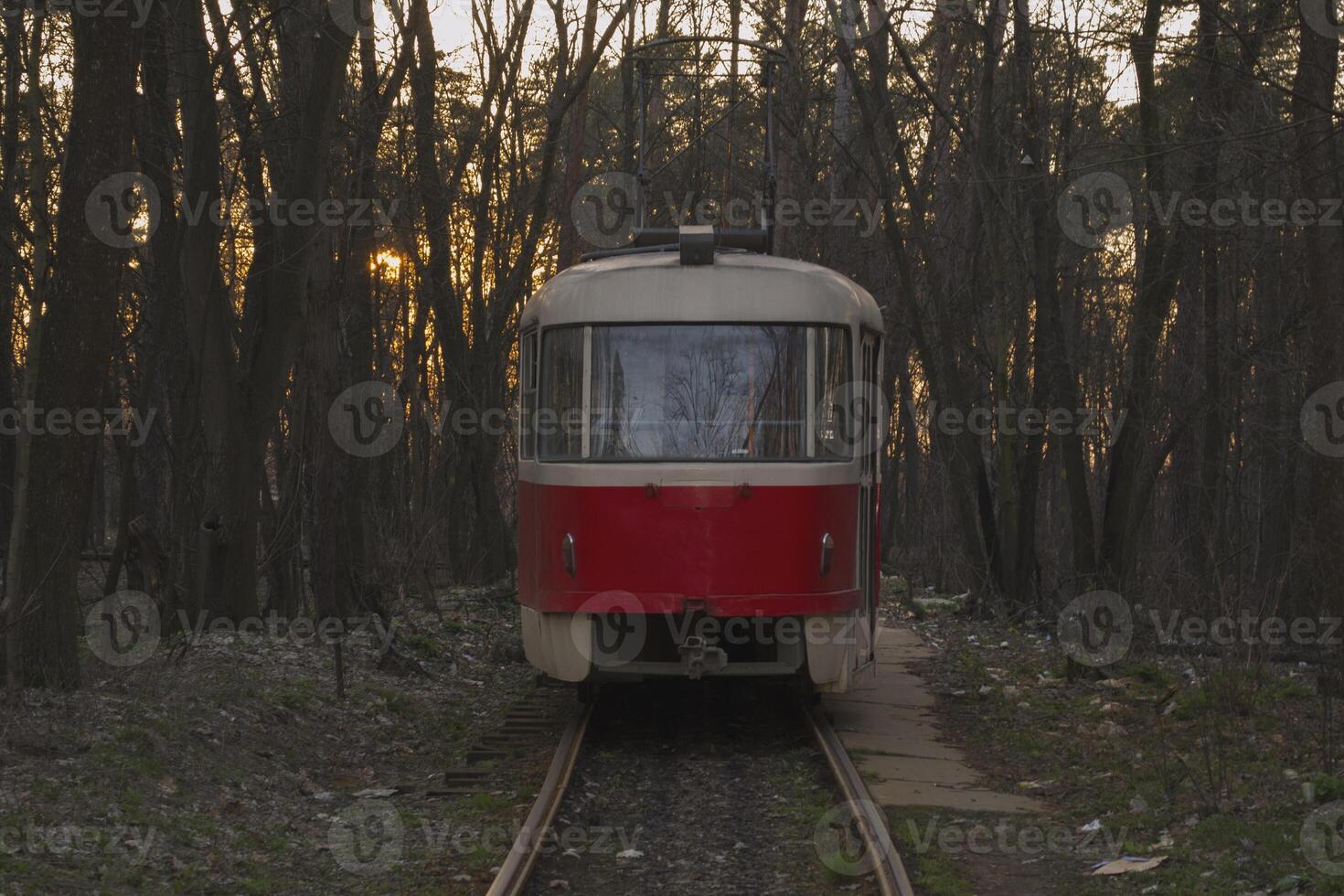 Vintage tram staying on a railroad station. photo