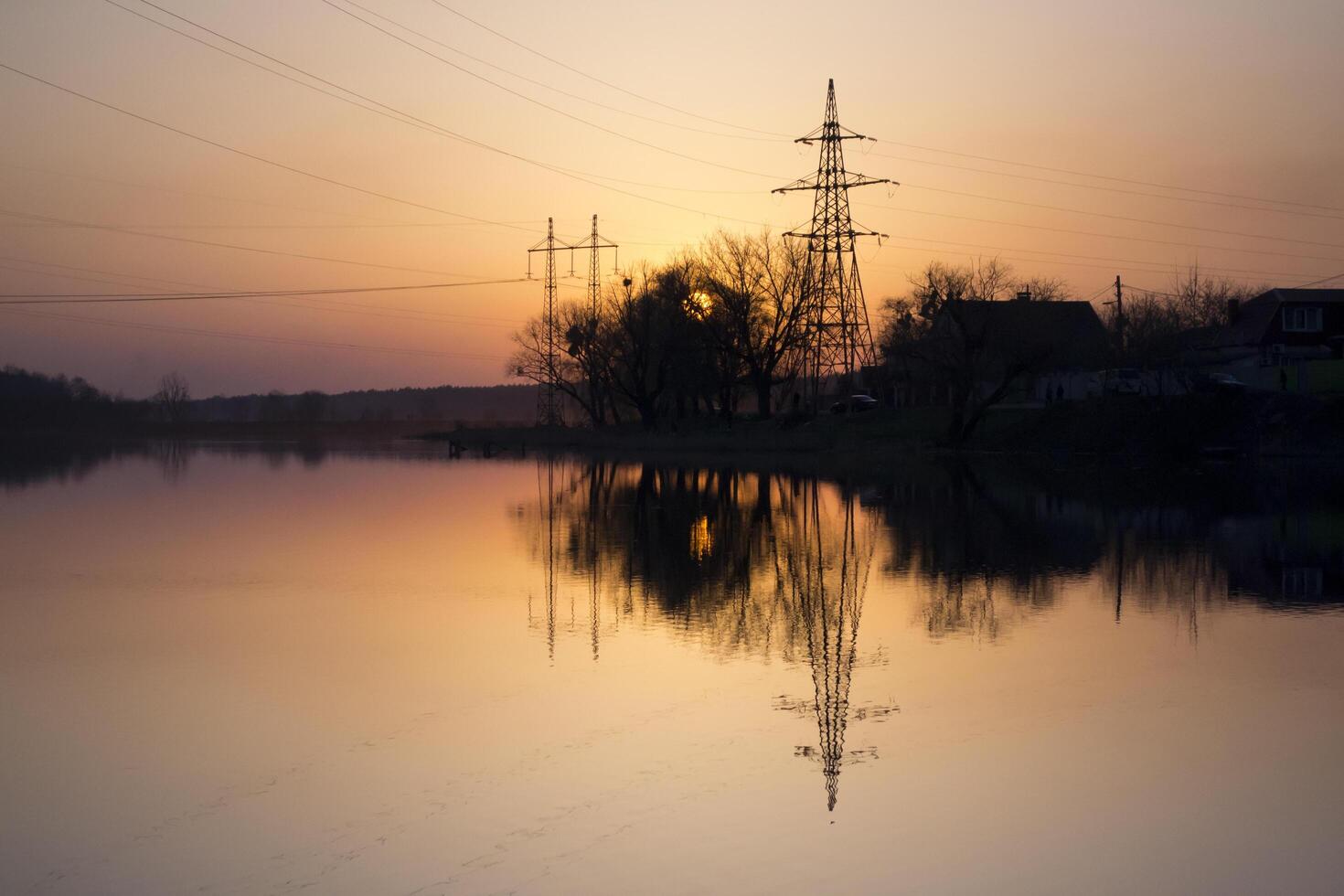 Sunset landscape. Pond at sunset time. Evening color of sky. photo