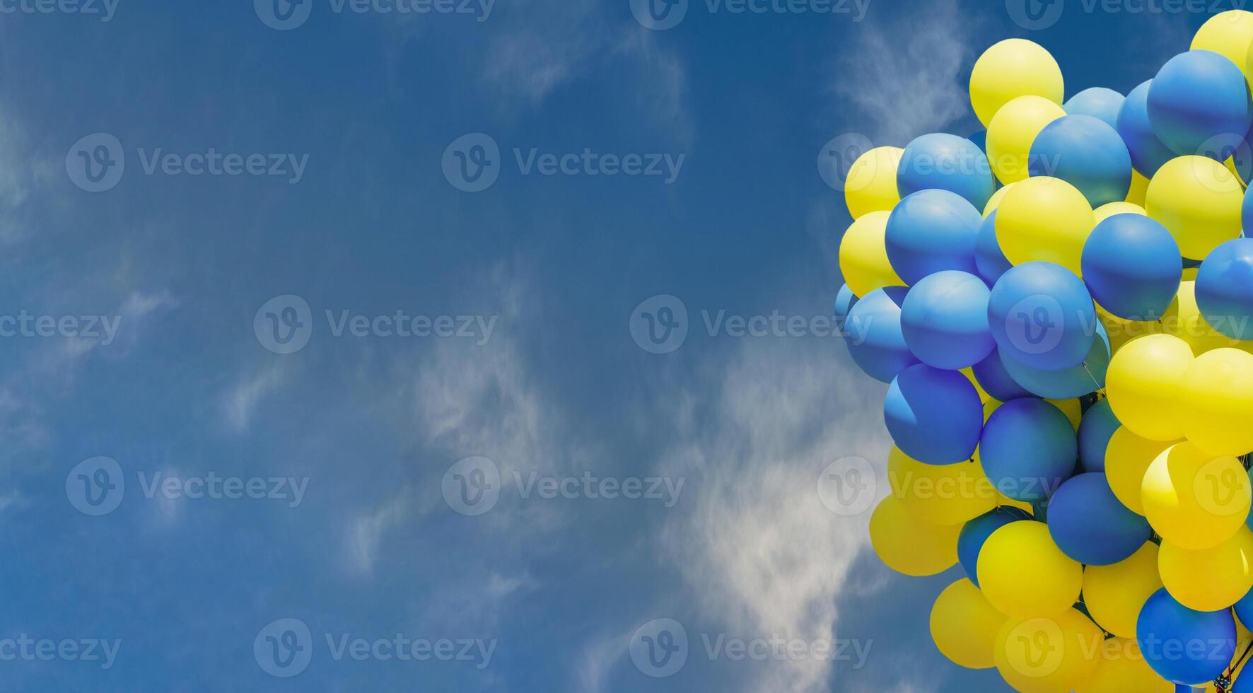 Yellow and blue balloons. Big bunch of balls. Balloon background with place for text. photo