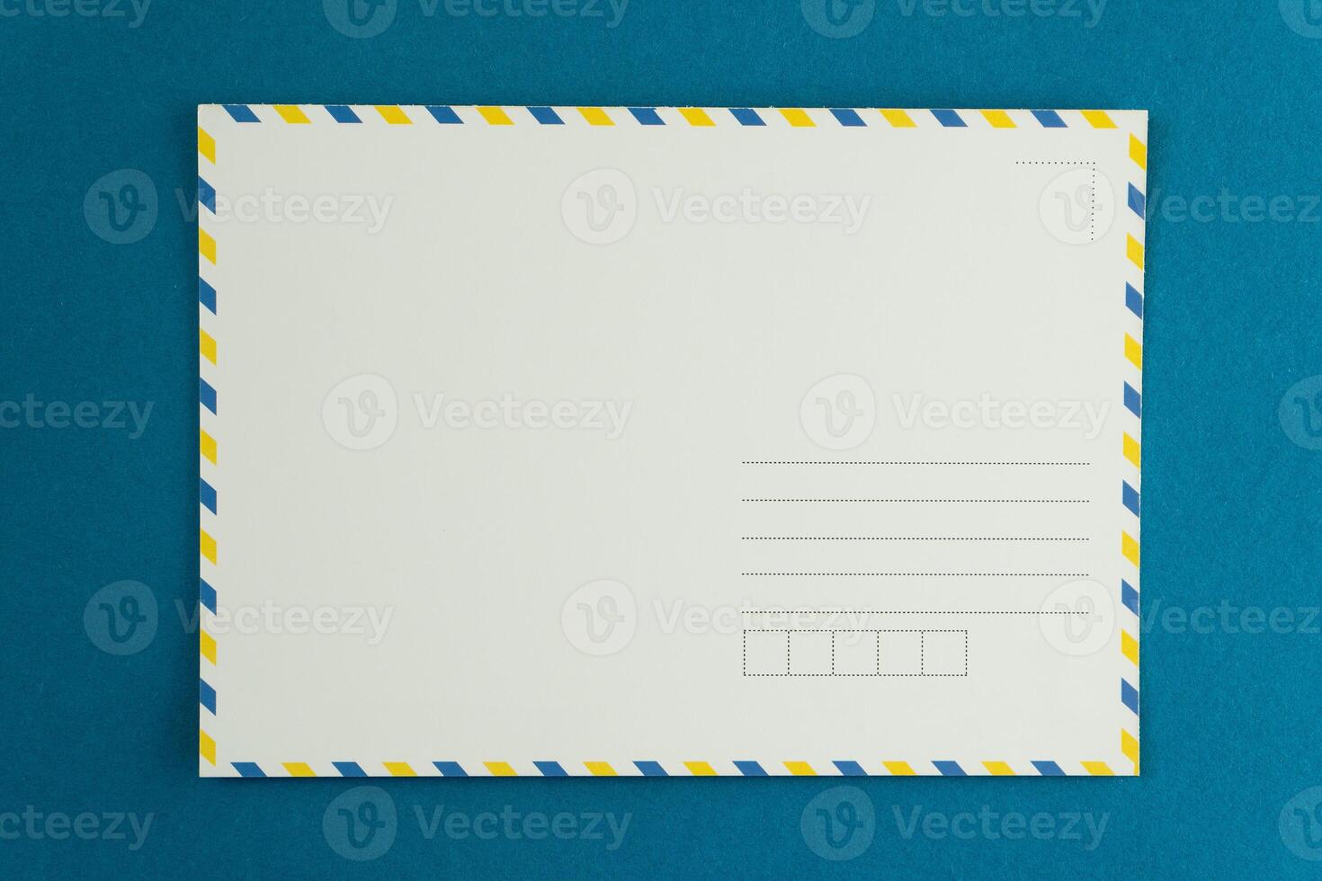 Blank postcard of an open letter. Mail background. Postcrossing layout place for text top view. Postal background. Stamp delivery envelope. Mockup copy space. photo