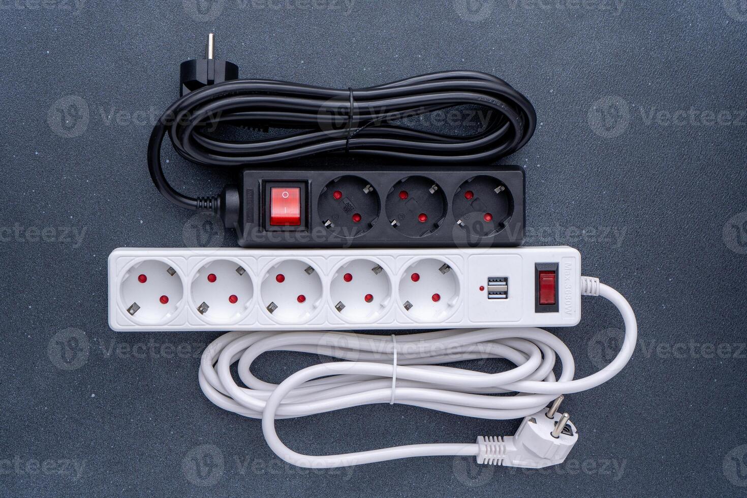 Electrical outlet extension cord. White cable with USB connector for charging phones. Electrical appliance. Extension cable photo