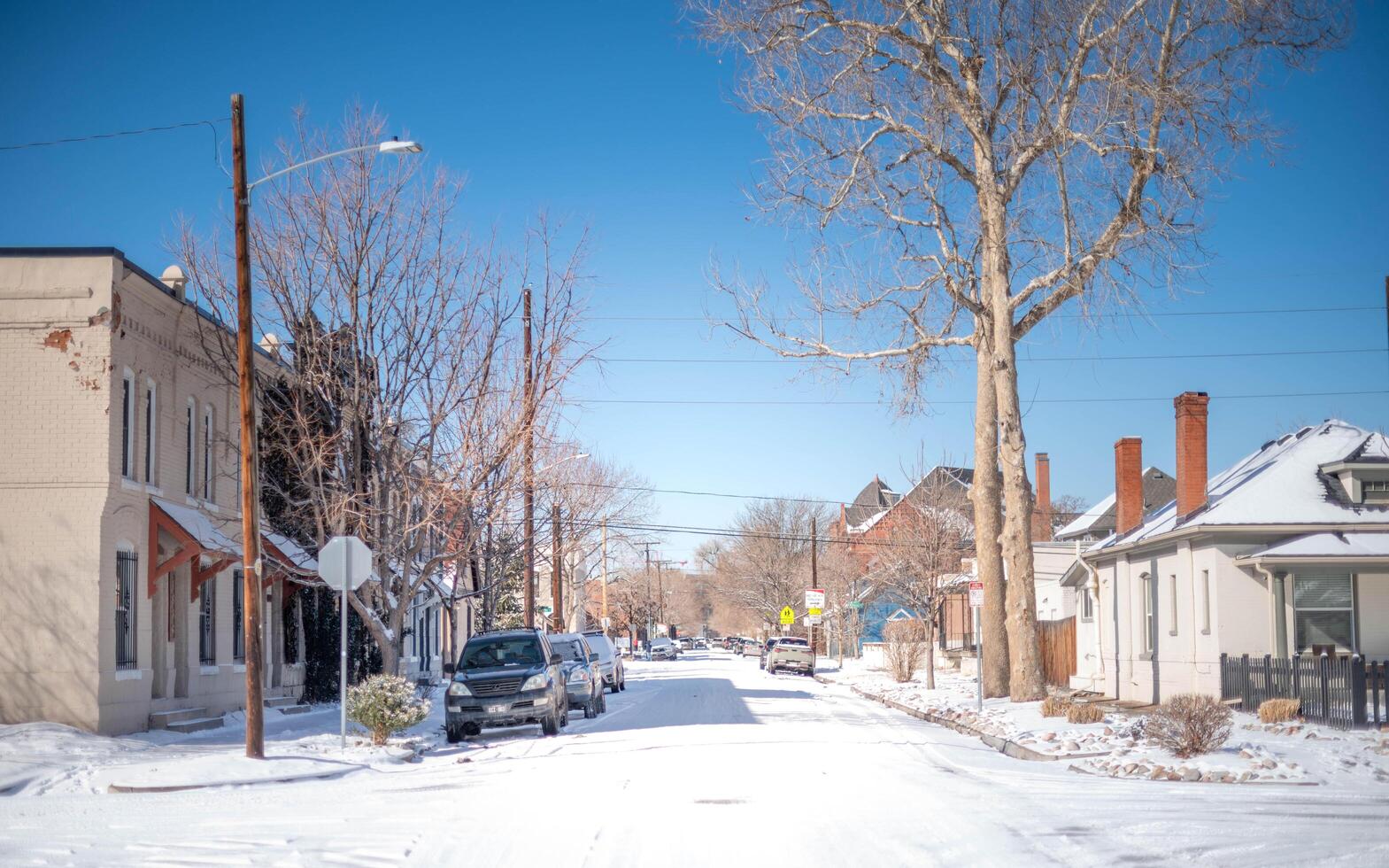 Snow covered alley and resident area at the Denver Downtown City in the   winter season and winter snow storm. photo