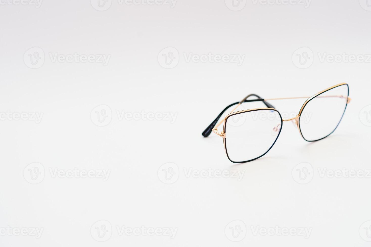 Black eyeglasses with white background photo