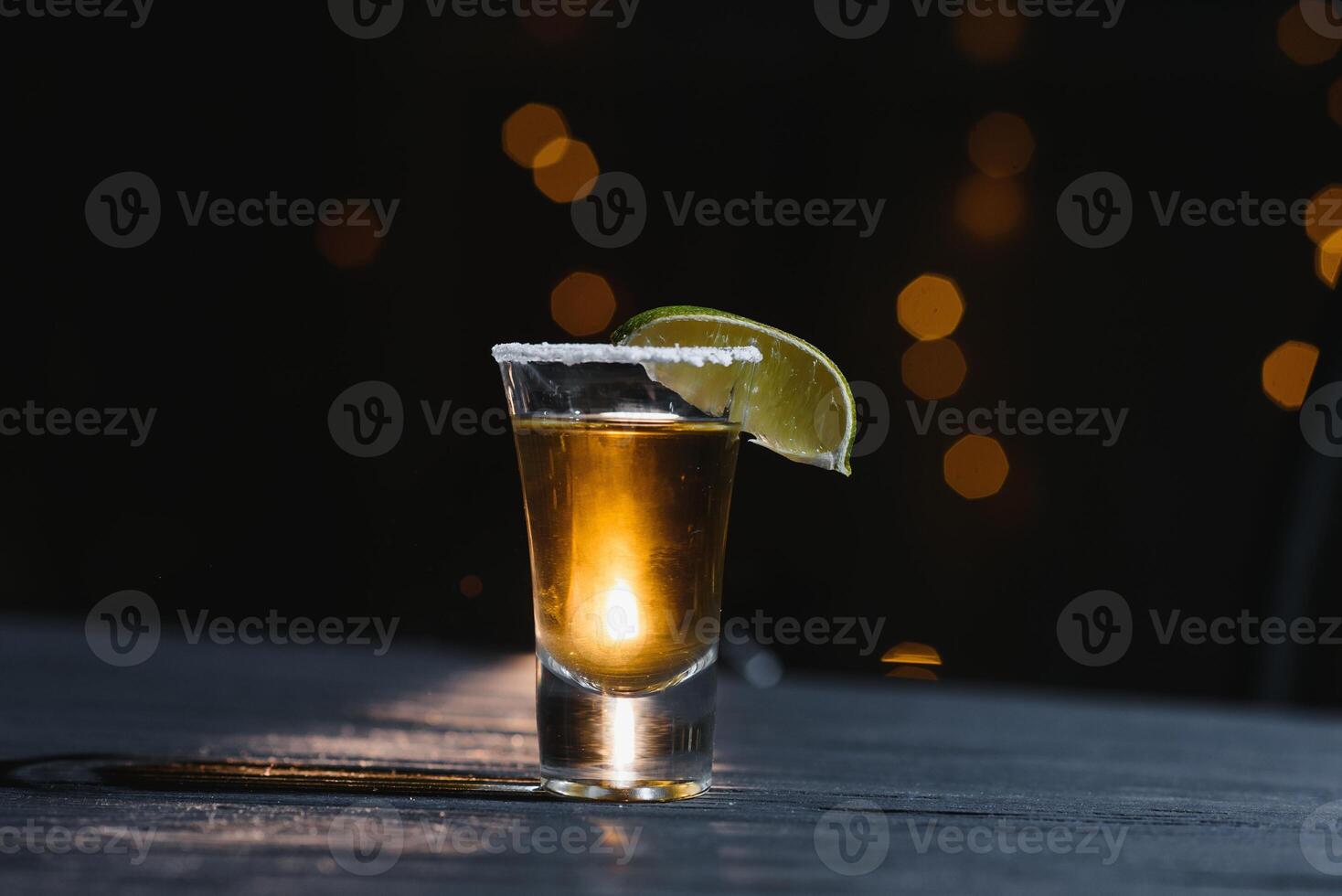 Tequila shot with lime . Selective focus photo