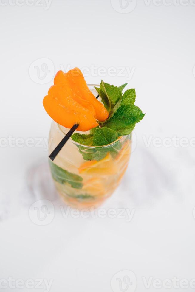 Fruit cocktail on a white background photo