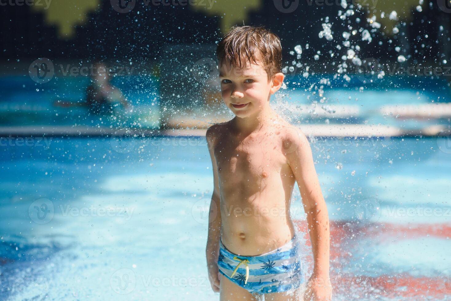 boy is in the water park. photo