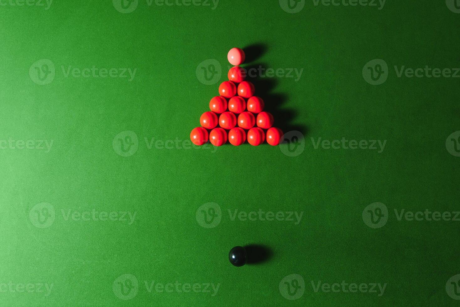 snooker balls on green surface, shallow depth of field photo