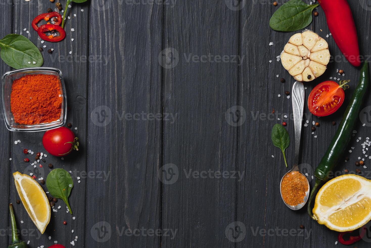 Cooking table. Background with spices and vegetables. Top view. Free space for your text. photo