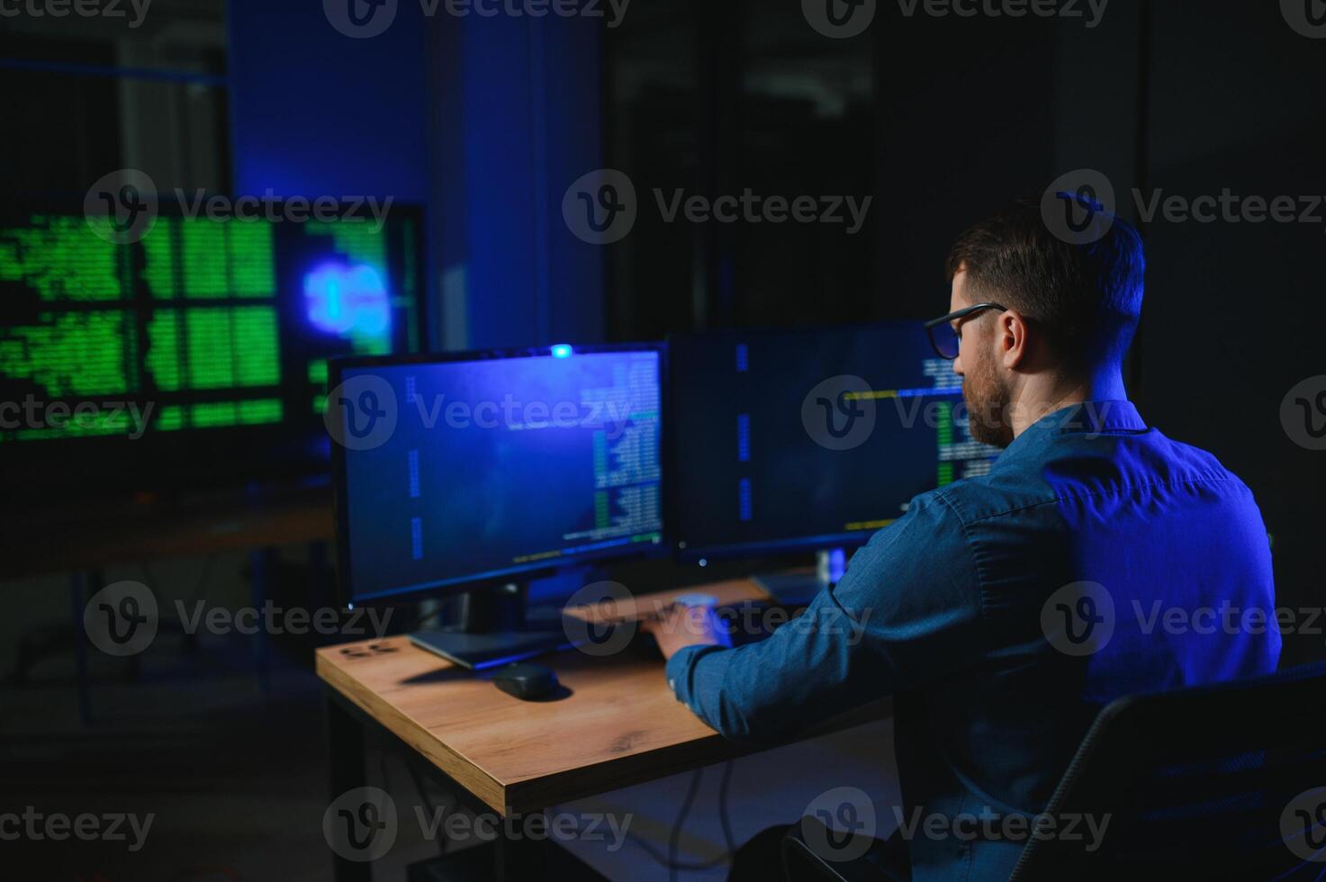 programmer working at desk in office photo