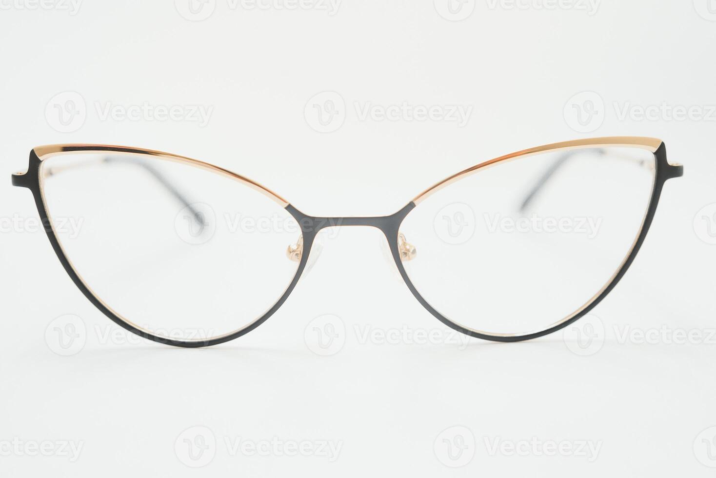 isolation glasses on white background. black and white combination oval eyeglass frames. oval eye glasses frame in the photo from above on a white background