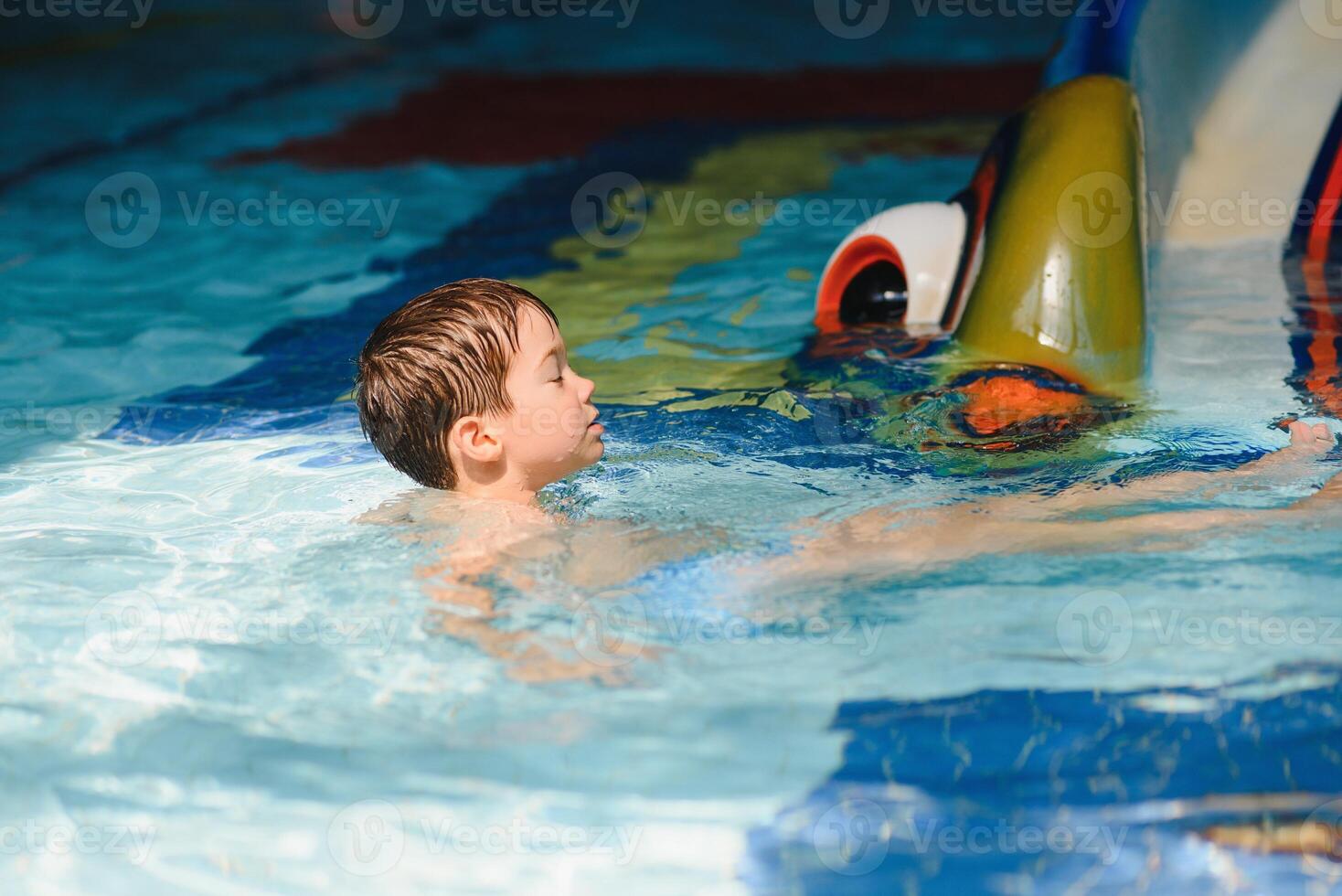 boy is in the water park. photo