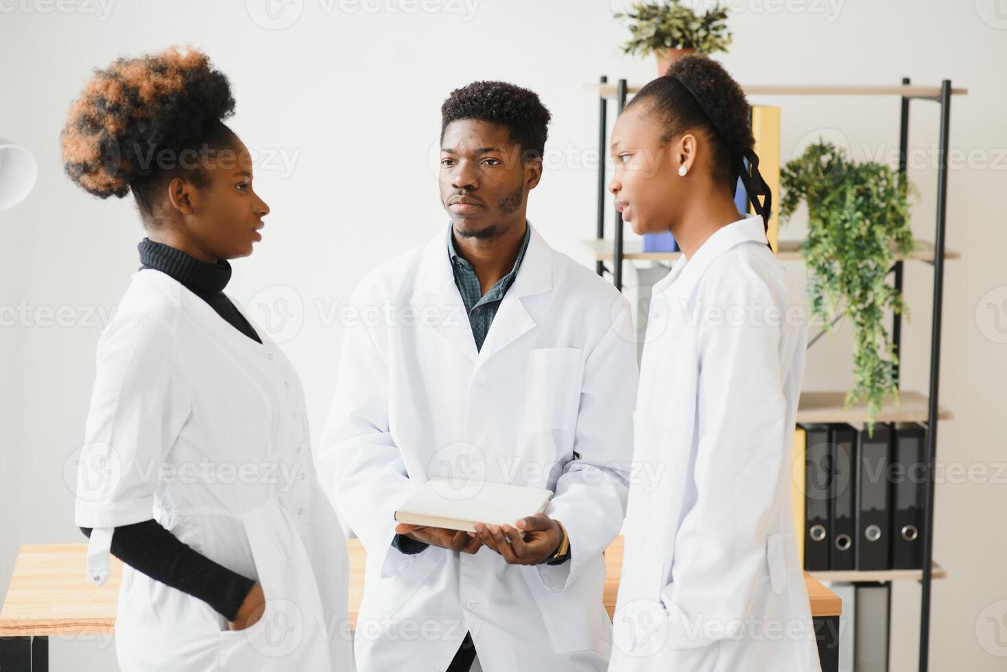 group of professionals medical workers working together. photo