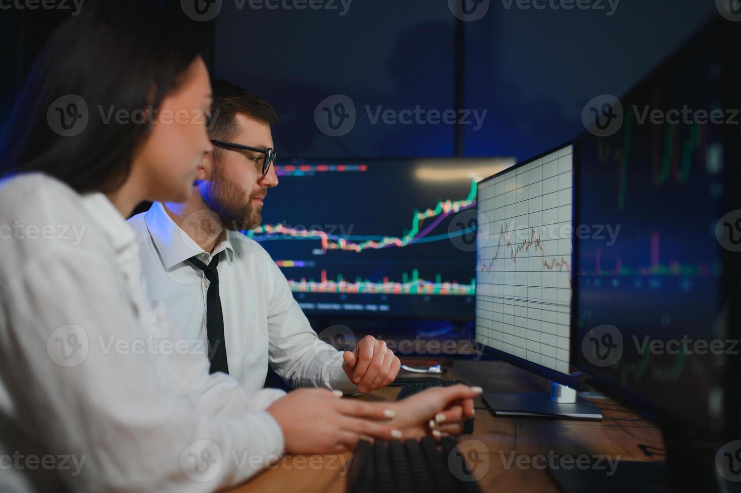 Business team investment working with computer, planning and analyzing graph stock market trading with stock chart data photo
