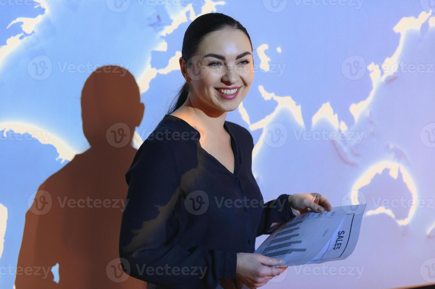 Buinesswoman with world map background photo